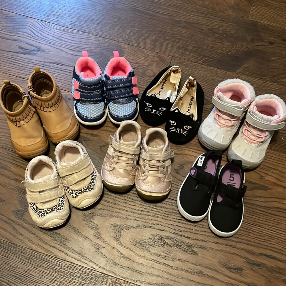7 pair of 5M and 5W toddler shoes.